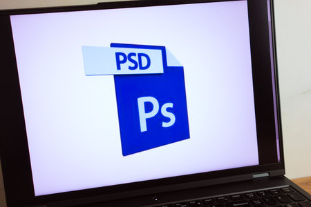 KONSKIE, POLAND - July 11, 2022: PSD Adobe Photoshop file logo displayed on laptop computer screenのeditorial素材