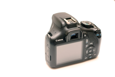 Kiev, Ukraine - June 24th, 2020: Canon DSLR camera without lens. Back view studio shot