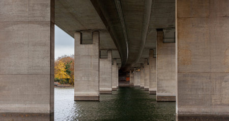 Bridge over the river in autumn, close-up view of the bridge