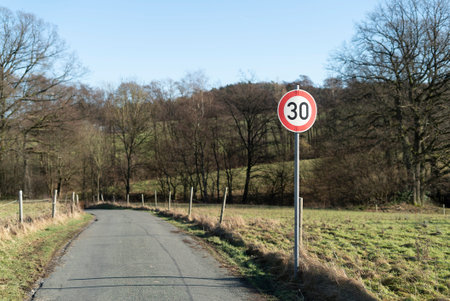 Traffic sign on a country road in the countryside in springtime