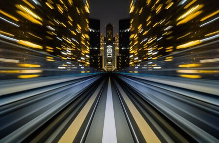 Motion blur train moving in city rail tunnel. Motion blur background abstract.の写真素材