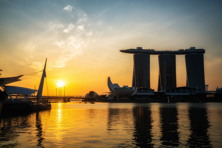 Singapore city, SINGAPORE - FEBRUARY 10, 2017 : Marina Bay Sands Hotel, Landmark of Singapore during morning sunrise at Marina Bay, Singapore.のeditorial素材
