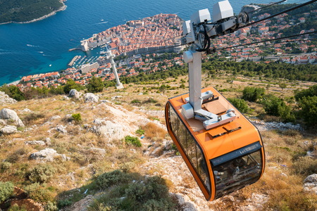 Panorama view of cable car and Dubrovnik Old Town in Dalmatia, Croatia - Prominent travel destination of Croatia. Dubrovnik old town was listed as UNESCO World Heritage Sites in 1979.のeditorial素材