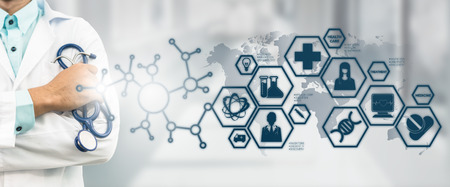 Medical Science Concept - Doctor in hospital lab with medical research icons in modern interface showing symbol of medicine innovation, medical treatment, discovery and doctoral analysis.の写真素材