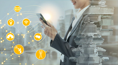 Smart city wireless communication network with graphic showing concept of internet of things ( IOT )...