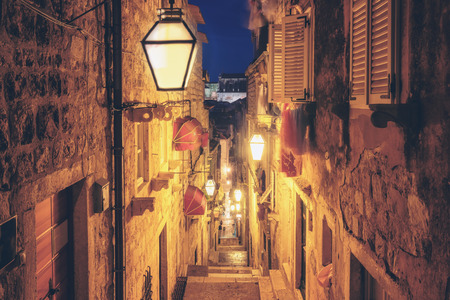 Famous narrow alley of Dubrovnik old town in Croatia at night - Prominent travel destination of Croatia.の写真素材