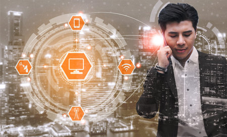 Smart city wireless communication network with graphic showing concept of internet of things ( IOT )...