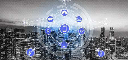Smart city wireless communication network with graphic showing concept of internet of things ( IOT )...