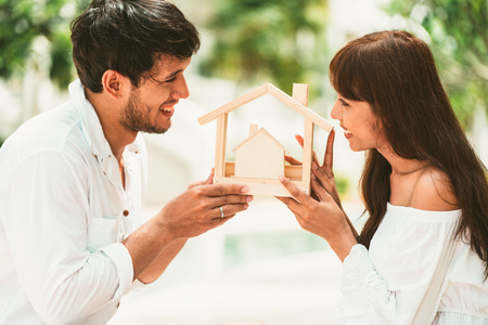 Young couple planning to buy a house and have happy living.の写真素材
