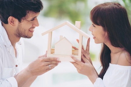 Young couple planning to buy a house and have happy living.の写真素材