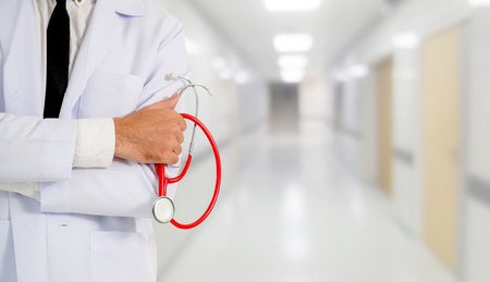 Young male doctor working at the hospital. Medical healthcare and doctor staff service.の写真素材