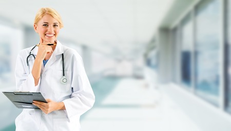 Woman doctor working at the hospital office. Medical healthcare and doctor staff service.の写真素材
