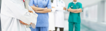 Healthcare people group. Professional doctor working in hospital office or clinic with other doctors, nurse and surgeon. Medical technology research institute and doctor staff service concept.の写真素材