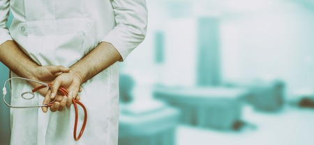 Young male doctor working at the hospital. Medical healthcare and doctor staff service.の写真素材