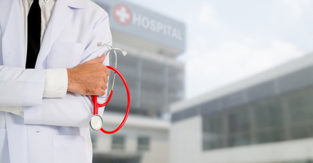 Young male doctor working at the hospital. Medical healthcare and doctor staff service.の写真素材