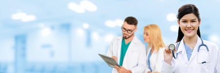 Healthcare people group. Professional doctor working in hospital office or clinic with other doctors, nurse and surgeon. Medical technology research institute and doctor staff service concept.の写真素材