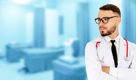 Young male doctor working at the hospital. Medical healthcare and doctor staff service.の写真素材