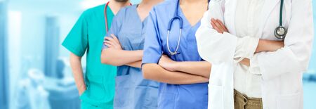 Healthcare people group. Professional doctor working in hospital office or clinic with other doctors, nurse and surgeon. Medical technology research institute and doctor staff service concept.の写真素材