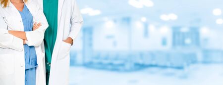 Doctor working with another doctor in the hospital. Healthcare and medical service.の写真素材