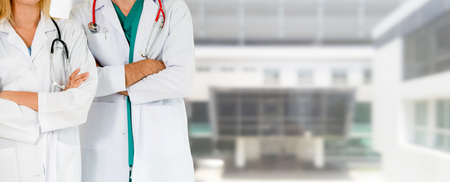 Doctor working with another doctor in the hospital. Healthcare and medical service.の写真素材
