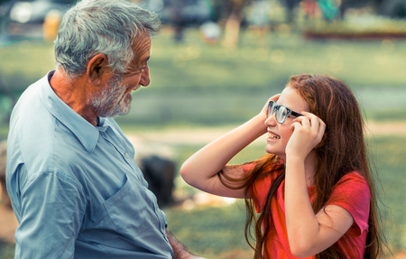 Happy family go vacation on weekend in the garden park in summer.の写真素材