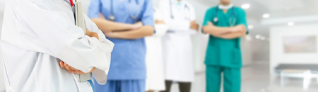 Healthcare people group. Professional doctor working in hospital office or clinic with other doctors, nurse and surgeon.の写真素材