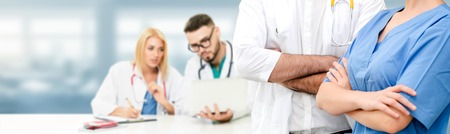 Healthcare people group. Professional doctor working in hospital office or clinic with other doctors, nurse and surgeon.の写真素材