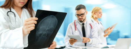 Healthcare people group. Professional doctor working in hospital office or clinic with other...