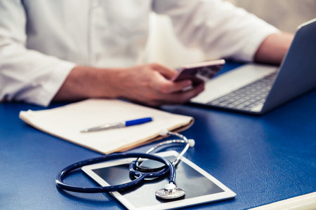 Doctor working in hospital office. Medical healthcare concept.の写真素材
