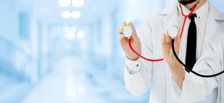 Doctor working with another doctor in the hospital. Healthcare and medical service.の写真素材