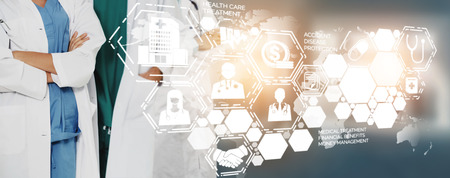 Medical Healthcare Concept - Doctor in hospital with digital medical icons graphic banner showing symbol of medicine, medical care people, emergency service network, doctor data of patient health.の写真素材