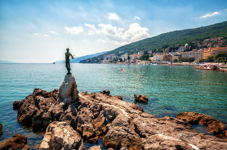 The historic statue of Maiden with the seagull is a symbol, not only of Opatija, but the entire Kvarner region. The statue on Adriatic coast is in the touristic town of Opatija in Croatia, Europeのeditorial素材