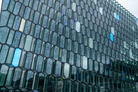 Reykjavik, Iceland - July 3, 2018 : Detailed view of Harpa building architecture which is a complex of concert hall, theater and conference center with unique design located in Reykjavik, Iceland.のeditorial素材