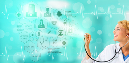Medical Healthcare Concept - Doctor in hospital with digital medical icons graphic banner showing symbol of medicine, medical care people, emergency service network, doctor data of patient health.の写真素材
