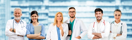 Healthcare people group. Professional doctor working in hospital office or clinic with other doctors, nurse and surgeon. Medical technology research institute and doctor staff service concept.の写真素材