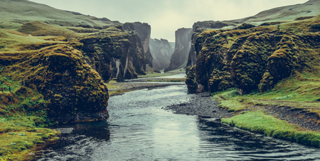 Unique landscape of Fjadrargljufur in Iceland. Top tourism destination. Fjadrargljufur Canyon is a massive canyon about 100 meters deep and about 2 kilometers long, located in South East of Iceland.の写真素材