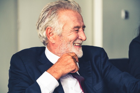 Senior male CEO executive businessman in office. Business people concept.の写真素材