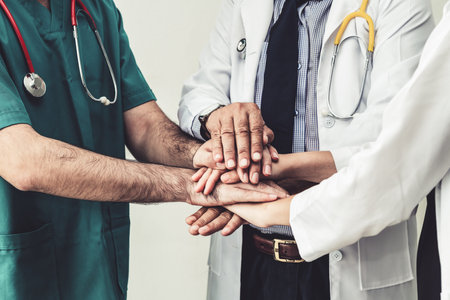 Healthcare people group. Professional doctor working in hospital office or clinic with other...