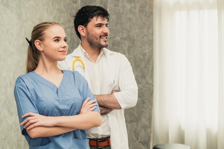 Doctor and nurse working in hospital. Healthcare and medical staff service concept.の写真素材