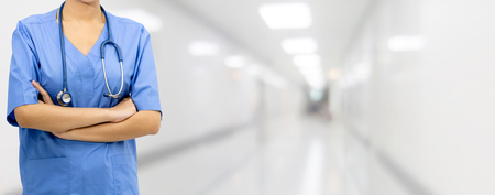 Female doctor or nurse at the hospital office. Medical healthcare business and doctor service.の写真素材