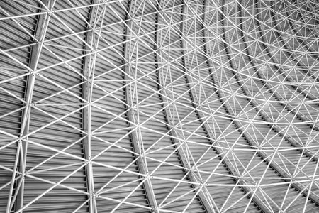 Modern interior architecture of metal steel roof structure of airport or industrial factory.