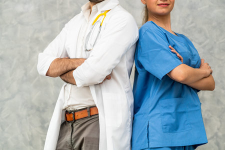 Doctor and nurse working in hospital. Healthcare and medical staff service concept.