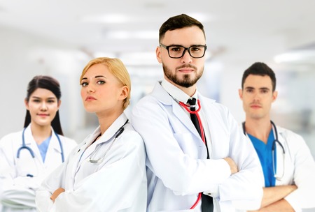 Healthcare people group. Professional doctor working in hospital office or clinic with other doctors, nurse and surgeonの写真素材