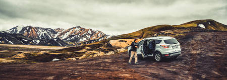 Landmannalaugar, Iceland - July 2, 2018: 4WD vehicle car travel off road in landscape of Landmannalaugar in highland of Iceland, Nordic, Europe.の写真素材
