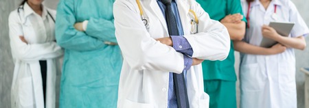 Healthcare people group. Professional doctor working in hospital office or clinic with other doctors, nurse and surgeon.の写真素材