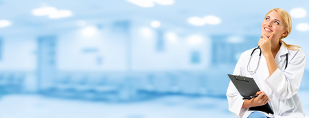 Woman doctor working at the hospital office. Medical healthcare and doctor staff service.の写真素材