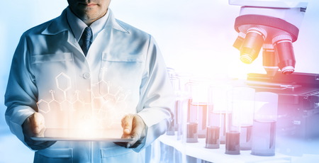 Research and development concept. Double exposure image of scientific and medical lab instrument, microscope, test tube and glass flask for microbiology and chemistry in laboratory for medicine study.の写真素材