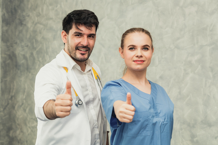 Doctor and nurse working in hospital. Healthcare and medical staff service concept.の写真素材