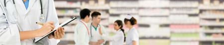 Healthcare people group. Professional doctor working in hospital office or clinic with other doctors, nurse and surgeon. Medical technology research institute and doctor staff service concept.の写真素材
