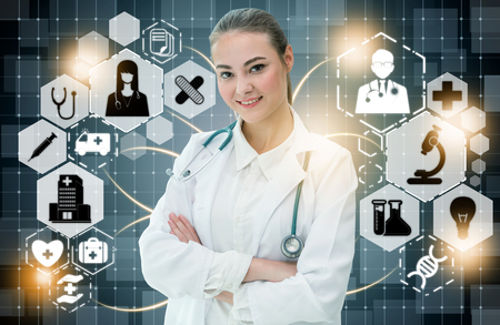 Medical Healthcare Concept - Doctor in hospital with digital medical icons graphic banner showing symbol of medicine, medical care people, emergency service network, doctor data of patient health.の写真素材